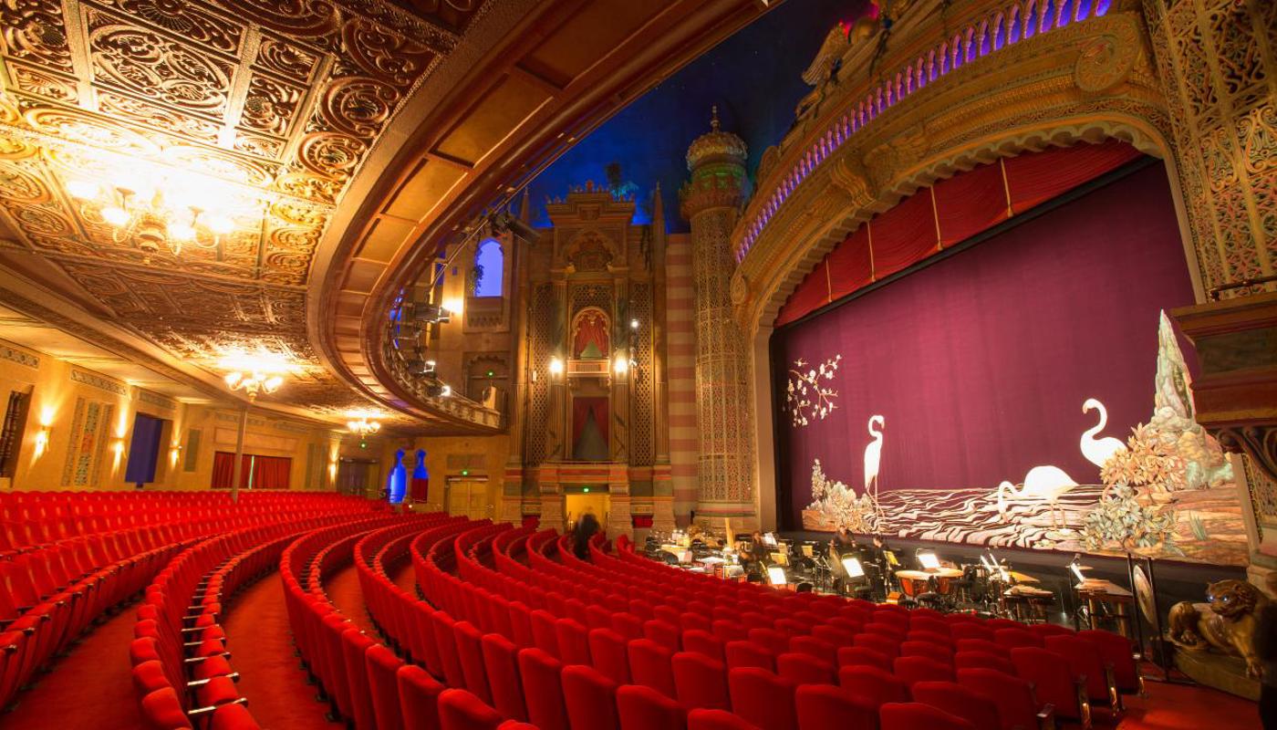 The Civic theatre auditorium showcasing the beautiful handcrafted Flamingo curtain.