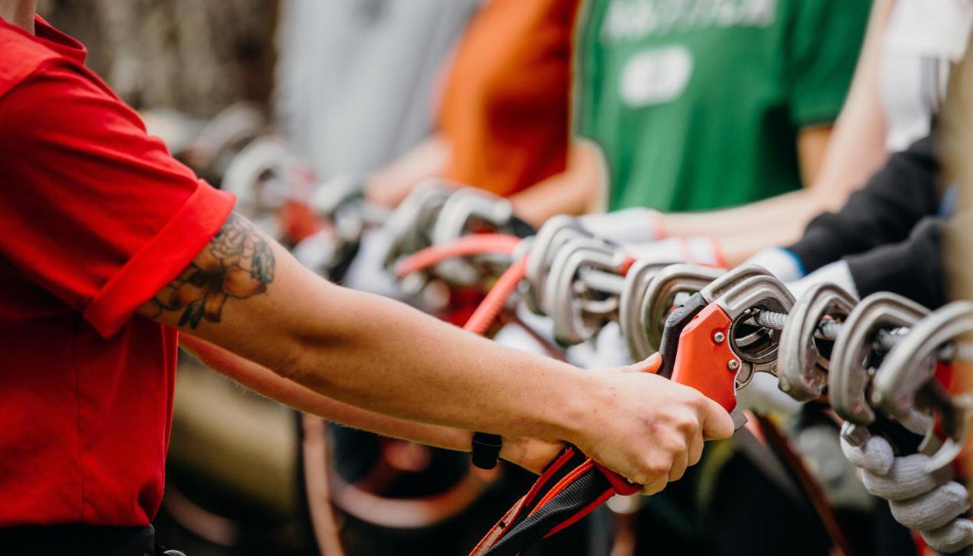 We use smart carabiners (CliC-iT Brand)